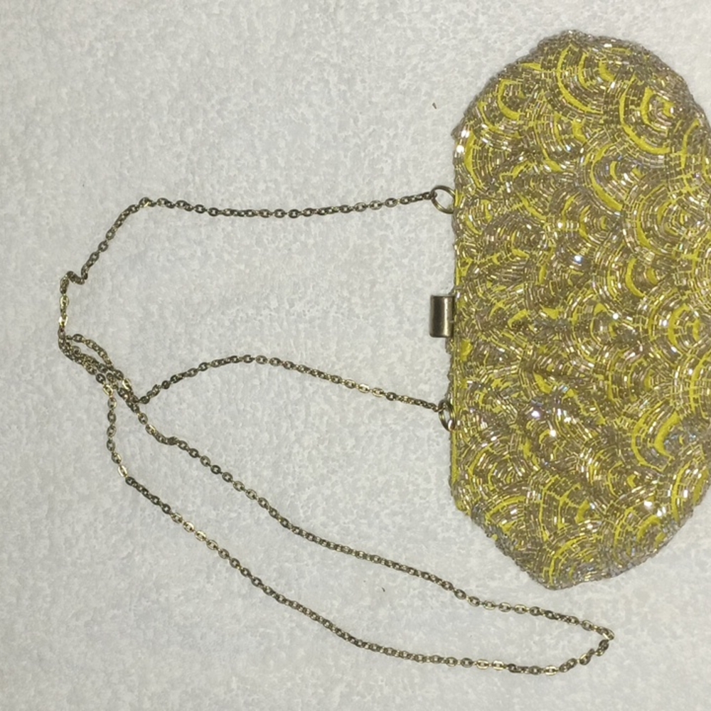Mrs Albright mustard color clutch